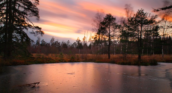 frozen Birkensee at sunset, long-time exposure