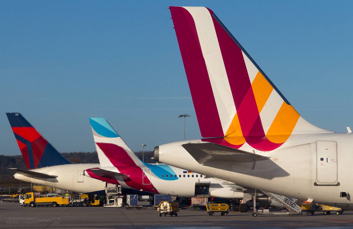 vertical tails of Germanwings, Eurowings and Delta aircraft in Germany