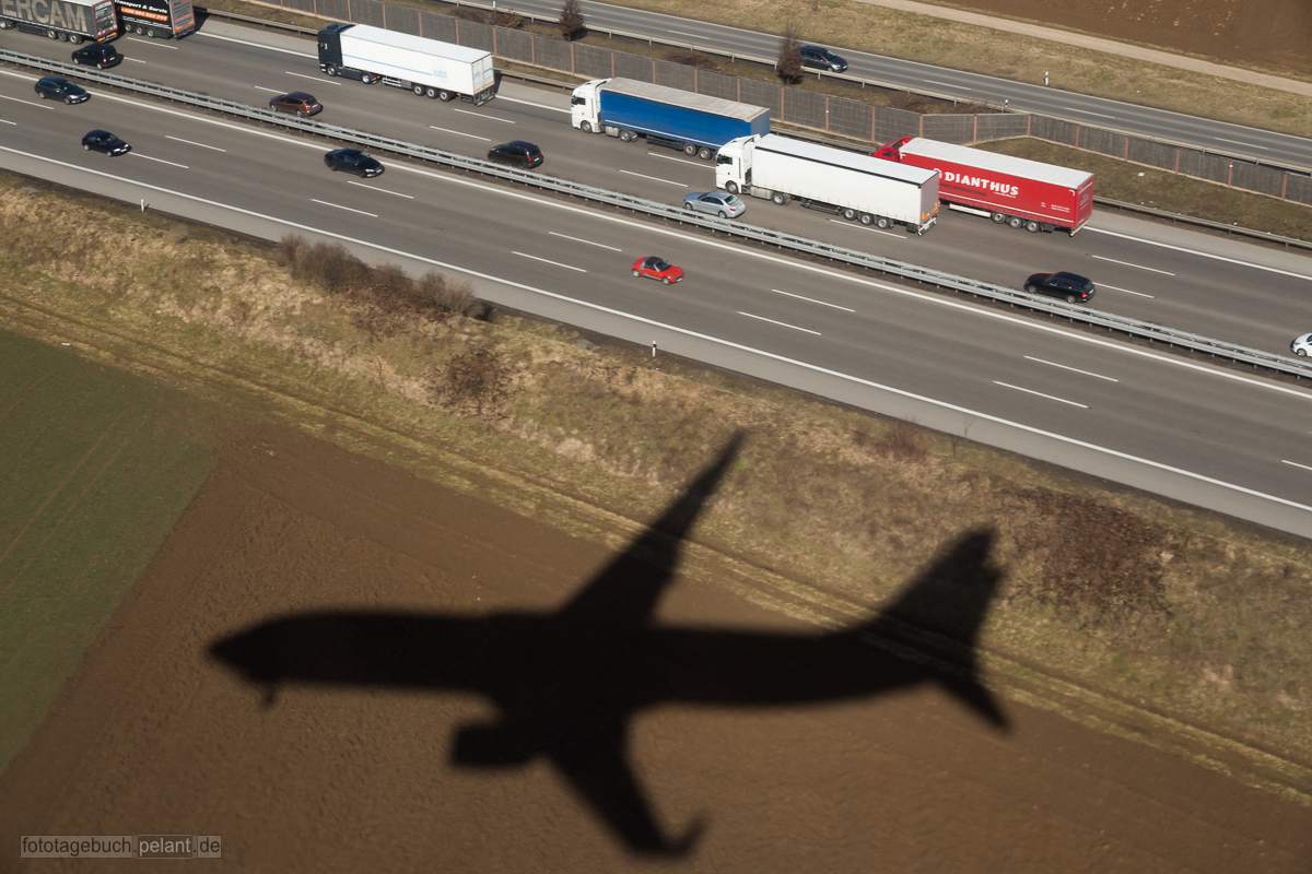 aircraft shadow and highway