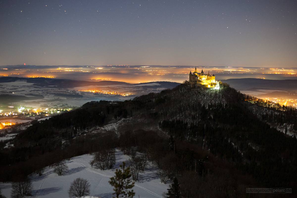 Hohenzollern castle at night in winter