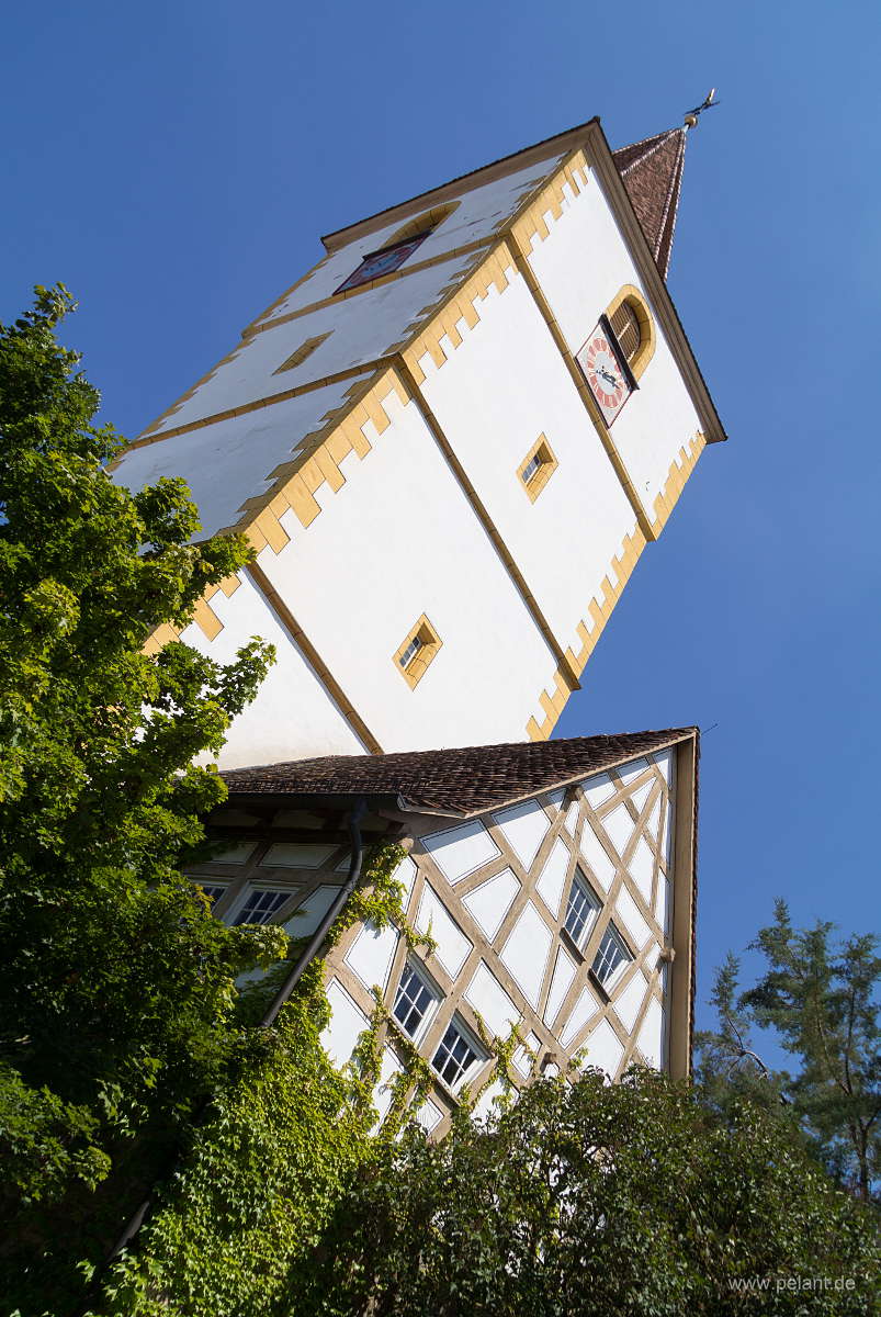 church tower of the Mauritiuskirche and half-timbered house in Holzgerlingen