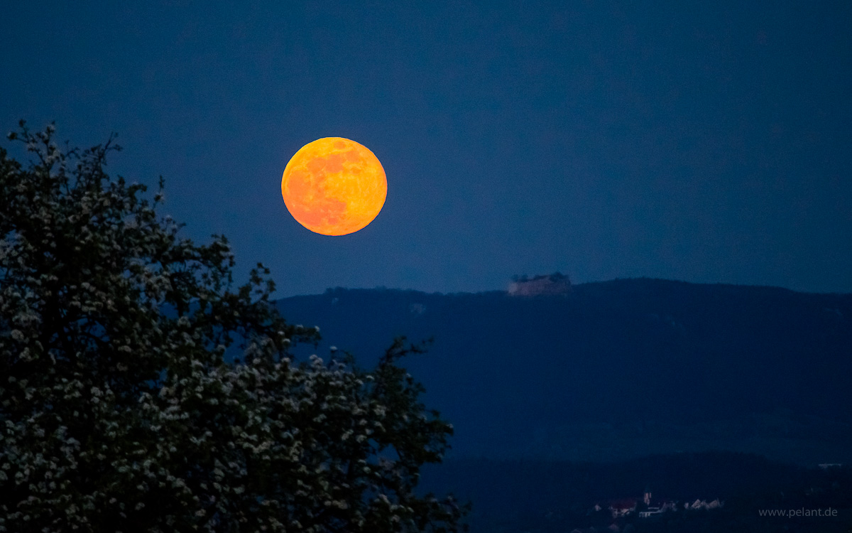 moonrise over the Schwbische Alb with Hohenneuffen castle ruin